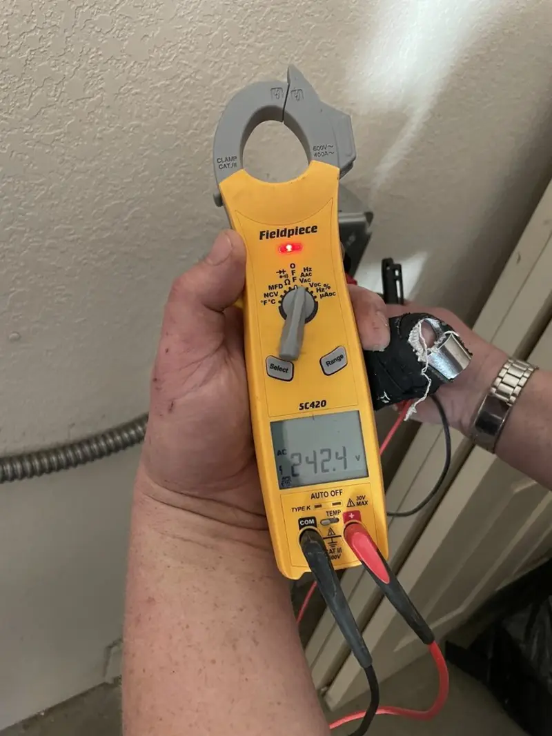 Voltage testing with clamp meter during Electrical Installation Services in Heidelberg